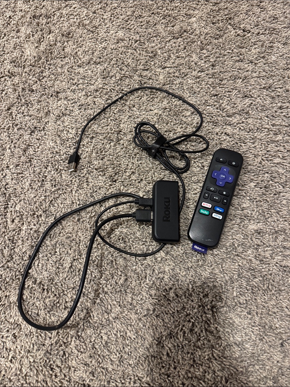 Roku Streaming Stick with Black Remote and Cables